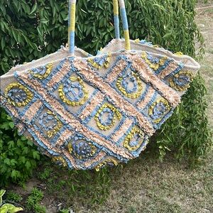 Women Bag with colorful flowered patterns.